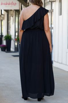 You'll look so fierce in this gorgeous dress! This dress has a beautiful black color with a flirty length and sleek material! This dress is perfect for any occasion, whether it is a plus on to a wedding or a fun holiday party! Style this dress with cute accessories and heels for a classy chic look! 100% Polyester Flowy Maxi Dress For Date Night, Chic Flowy Dress For Date Night, Chic Flowy Skirt Prom Dress, Long Chiffon Dress For Date Night, Flowy Maxi Dress For Party, Black Flowy Sleeveless Midi Dress, Flirty Flowy Maxi Dress For Date Night, Flirty Flowy Maxi Dress, Black Maxi Length Prom Dress