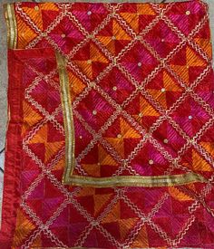 Mothers day gift orange pink colour Phulkari Dupatta for women | Phulkari also called Indian Dupatta | Used as Dupatta Stole  Phulkari is traditional artwork of Embroidery indigenous to Punjab region of India. Punjabi women traditionally created it with hand over many days to gift/wear on occasions. This heritage of Punjab is preserved in our Phulkari Dupatta. Hope you have a glimpse of this rich heritage through our Dupattas.  Our feather-soft threads have the lustre that will add a distinct sparkle to your look. Be it your traditional outfit or a modern ensemble, a phulkari dupatta can never go wrong in adding its appeal to your elegance. These timeless pieces will always stay as your prized possessions.  Light Phulkari Dupatta for Women with Full Hand Work All Over It Premium Multi Colo Traditional Phulkari Embroidery Design, Indian Dupatta, Phulkari Embroidery, Orange Pink Color, Phulkari Dupatta, Golden Leaf, Traditional Artwork, Rose Orange, Golden Leaves