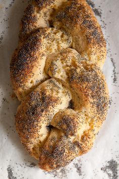 two pieces of bread on top of a piece of paper with sprinkles