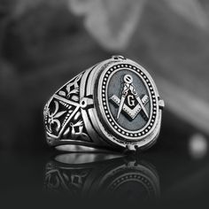 Blue Lodge Masonic Ring, Mason Ring, Freemason Statement Ring, Custom Masonic Ring for Men, Master Mason Signet Ring, Freemasonry Ring Personalized Handmade Masonic Silver Rings ✅ Made of 925 Sterling Silver ✅ Finish Color: Sterling Silver, Gold Plated, Black Rhodium Plated ✅ Dimensions: 21 x 19mm ✅ Weight: ±14gr Unlock the secrets of Freemasonry with our exquisite collection of custom handmade Masonic silver rings. Each ring is meticulously crafted by skilled artisans, using high-quality sterling silver to ensure both elegance and longevity. Symbolizing brotherhood, wisdom, and enlightenment, these rings are perfect for Freemasons who take pride in their membership. These exceptional rings are designed to commemorate your individual achievements and milestones, creating a treasured heirlo Blue Lodge Masonic Rings, Mason Ring, Masonic Ring, Ring For Men, Personalized Rings, Black Rhodium, Ring Fit, Signet Ring, Statement Ring