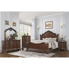 a bedroom scene with focus on the bed and dresser