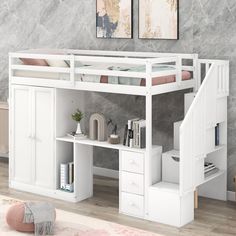 a white loft bed with stairs and desk underneath it in a room that has marble walls