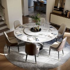 a round table with chairs around it