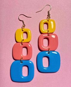 Lightweight.  Approx 3 inches long, 2 inches wide.  Shiny top coat gives this a nice polished  groovy finish. 70s Aesthetic Earrings, 70s Style Earrings, 70s Inspired Clay Earrings, Retro Jewelry 70s, 70s Fashion Accessories, 70’s Earrings, Vintage Earrings 70s, Retro Clay Earrings, 70s Jewelry Disco