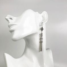 925 Sterling Silver Handmade Artisan Crafted Filigree Dangle Drop Tassel Earrings Material: 925 Solid Sterling Silver, 925 Stamped Earrings Length: 3.30 inches Width: 0.35 inches Finishing: Oxidized and Polished Comes with a gift pouch and box Free Domestic Shipping We hope that you enjoy our exclusive artisan handcrafted jewelry. Elegant Silver Long Drop Tassel Earrings, Silver Long Drop Tassel Earrings As Gift, Silver Long Drop Tassel Earrings For Gift, Silver Elegant Tassel Drop Earrings, Elegant Silver Earrings With Tassels, Elegant Silver Tassel Drop Earrings, Elegant Silver Tassel Earrings For Gift, Silver Tassel Single Earring As Gift, Elegant Metal Dangle Tassel Earrings