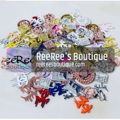 there is a pile of different colored and metal items on the table with text overlay that says reese's boutique