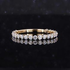 Moissanite Wedding Band 14K Gold Single Prong Band Floating Bubble Band Minimalist Ring Stackable Band Moissanite Full Eternity Band  𝟐𝐌𝐌 𝐁𝐚𝐧𝐝 𝐃𝐞𝐭𝐚𝐢𝐥𝐬 ● → Stone Shape: Round Cut → Stone Size: 2MM → Stone Total Carat Weight: 0.832 (App.) → Stone Type: Moissanite → Stone Color / Clarity: DEF Color / VVS → Band Top width:2MM (App.) → Band Bottom width: 2 MM (App.) → Band Top thickness: 2 MM (App.) → Band Bottom thickness: 2 MM (App.) ❃ 𝐒𝐩𝐞𝐜𝐢𝐚𝐥𝐭𝐲 𝐚𝐧𝐝 𝐍𝐨𝐭𝐞𝐬 ↣ Customized Moissanite Wedding Band, Stackable Bands, Half Eternity Band, Band Jewelry, Moissanite Wedding Bands, Minimalist Ring, Minimalist Rings, Eternity Band, Stackable Rings