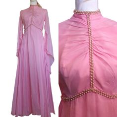 Vintage 70s Womens Size 4 Pink Chiffon Long Formal Dress Sheer Butterfly Sleeves Bubblegum pink Fits modern 4 Acetate liner Long sheer angel wings /butterfly sleeves Mockneck Woven pearls around empire wIst and neckline Rear zipper Floor length Looks unworn (Slightly loose bead with 1 off) Union made Dry clean only Bottom hem has chiffon unrolled in small spot as shown Still has cardboard tag on inside Approximate measurements laid flat  Chest 16" Shoulders 15" Waist 13.5" Hips 22" Length 54" Wings Butterfly, Long Formal Dress, Pink Dress Women, Pink Chiffon, Pink Fits, Union Made, Butterfly Sleeves, Flat Chest, Bubblegum Pink