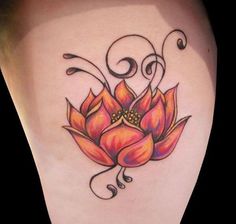 the back of a woman's stomach with a flower tattoo on it