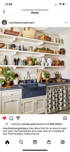 the instagram page shows an image of a kitchen with white cabinets and blue counter tops