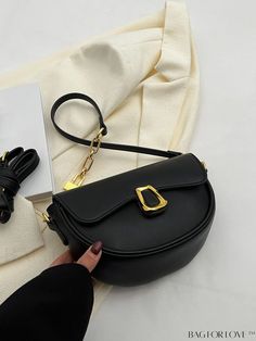 BagForLove - Sophisticated Metal Flap Saddle Bag Product Description Color Black Type Saddle Bag Bag Size Small Strap Type Chain Pattern Type Plain Style Fashionable Material PU Leather Size Chart INCH CM Strap Length Bag Length Bag Width Bag Height Handle Height 47.2 inch 8.7 inch 3.1 inch 6.3 inch 10.2 inch Strap Length Bag Length Bag Width Bag Height Handle Height 120 cm 22 cm 8 cm 16 cm 26 cm Details Pictures Similar Products h2 { text-align: center; } /* æ¢è¡ */ li{ white-space: normal; w Elegant Large Capacity Saddle Bag For Shopping, Black Flap Bag With Single Shoulder Strap, Trendy Saddle Shoulder Bag With Gold-tone Hardware, Chic Large Capacity Saddle Bag For Shopping, Trendy Saddle Bag For Evening, Trendy Saddle Shoulder Bag For Evening, Black Handheld Baguette Bag With Gold-tone Hardware, Trendy Black Baguette Bag With Gold-tone Hardware, Trendy Evening Saddle Shoulder Bag