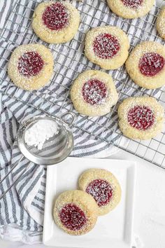 powdered sugar cookies on a cooling rack