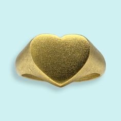 An adjustable band with a with a heart shaped signet top. Metal: 24kt gold-plate over brass Adjustable A With A Heart, Snake Ring Gold, Heart Signet Ring, Knife Necklace, Snake Ring, Brass Necklace, Gold Snake, 24kt Gold, Gold Heart