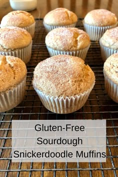 gluten - free sourdough snickkerdoodle muffins on a cooling rack