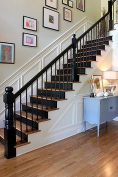 the stairs in this home are black and white