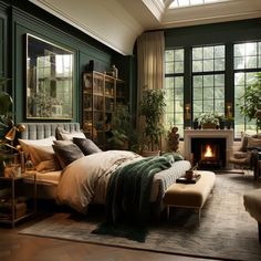 a bedroom with green walls and a fireplace in the corner is furnished with an ottoman bed