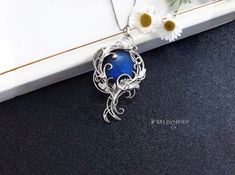 This Elven floral leaves necklace is wrapped in silver wire with dark blue Labradorite.                                                                                               It can be a unique decoration for a festive occasion or a lovely gift.                                                                                                                                                 Jewelry by Jewelryshore -https://jewelryshore.etsy.com Several techniques were used to create this beautiful pendant. This handmade item was soldered, forged, hammered, wrapped, oxidized (the silver part of the item ) then cleaned and polished to a high shine. All details are handmade.  The pendant requires careful handling and care. After a while, the metal slightly darkens. To restore the original Leaves Necklace, Fantasy Necklace, Moonstone Pendant Necklace, Floral Leaves, Witch Jewelry, Unique Gifts For Women, Leaf Jewelry, Labradorite Necklaces, Blue Labradorite