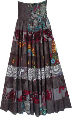 A two-in-one skirt that can be dressed as both a skirt and a dress with mixed floral, abstract and ethnic prints.  The skirt has a tiered construction and a great fall. #tlb #TieredSkirt #vacationclothing #beachwrap #Floral #Printed #bohemianfashion #Tieredskirt #Smockedskirt #Rayonskirt #Skirtdress Bohemian Tiered Multicolor Skirt, Multicolor Tiered Skirt With Floral Print, Multicolor Tiered Gathered Skirt Dress, Multicolor Tiered Dress With Gathered Skirt, Brown Patchwork Tiered Skirt, Multicolor Tiered Lined Skirt, Eclectic Townhouse, Whimsigoth Style, Trippy Clothes