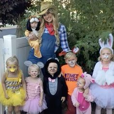 a group of children dressed up in costumes