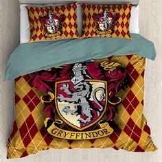 a bed with a harry potter crest on it