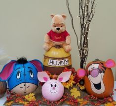 winnie the pooh and friends painted on pumpkins