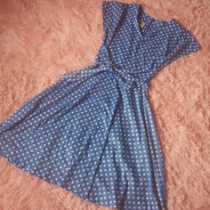 Super cute 60s era dress in blue with white polkadots. Polyester Measurements: 11.50' across waist total 23 inches Size 3 V neck Waist drop 16.5 Total length 39' Cap sleeve Neck line 7' Full skirt/ fitted waist Machine wash warm tumble dry Brand: Miss Kitty tag reads size 12 Excellent vintage condition Retro Polka Dot V-neck Dress, Retro V-neck Polka Dot Dress, 1950s Style A-line Polka Dot Dress, 1950s Style Polka Dot Dresses For Spring, Spring Polka Dot Vintage Dress, Vintage V-neck Polka Dot Dress, Blue Knee-length Vintage Dress 1950s Style, Blue 1950s Style Knee-length Vintage Dress, Blue Knee-length 1950s Vintage Dress