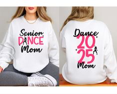 Super Comfy Senior Dance Mom Sweatshirt. Great gift for Mom of Grad 2025. Heather Colors: 80% Cotton, 20% Polyester Solid Colors: 50% cotton, 50% polyester >> Please check size charts before ordering! PRODUCT DETAILS       * Our products are unisex       * If you would like a tighter fit, please order one size down for shirts. For Comfort Colors, order 2 sizes up for T-shirt Dress.       * For Gildan Sweatshirts and Hoodies, sizing runs true to fit. Order up for oversized look.      * Follow car Senior Dance Mom Shirts, Dance Grandma Shirt Ideas, Senior Dance Mom Shirt, Dance Team Sweatshirts Design, Cheap Graphic Print Sweatshirt For Dance Class, Dance Mom Sweatshirt Ideas, Senior Season, Dance Mom Shirts, Mama Crewneck