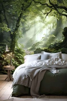 a bedroom with a forest mural on the wall