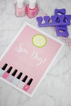 a pink poster with nail polish on it next to some scissors and other crafting supplies