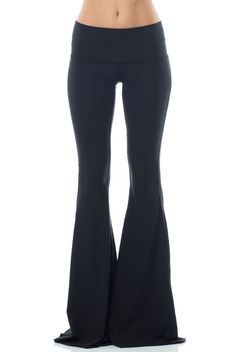 Teeki Solid Black Bell Bottom Black Flare Loungewear Pants, Trendy Stretch Full Length Flares, Flare Yoga Pants For Fall, Black Flare Bottoms For Loungewear, Trendy Black Flared Hem Pants, Stretch Black Flares For Night Out, Black Stretch Flares For Night Out, Sporty Flared Bottoms For Loungewear, Flare High Stretch Loungewear Bottoms