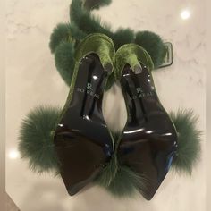 Our “Plush Pleasure” Heels Are Made With A Vegan Leather With Green Apple Fur Fluff. The Heel Is Measured At 4.72 Inches And Finished With Agreen Outsole. Green Heels With 4-inch Heel For Party, Green 4-inch Heels For Night Out, Green Open Heel Evening Heels, Green Evening Heels With Heel Strap, Evening Green Heels With Heel Strap, Glamorous Green Ankle Strap Heels, Fitted Green Heels With 4-inch Heel, Green Wrapped Heel Evening Heels, Green Heels With Heel Strap For Cocktail