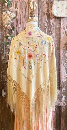 "1920s Silk Fringe Piano Shawl with Pastel Floral Embroidery 33\" x 35\" (not including 10\" fringe)  Condition: Good Vintage Condition Few spots of discoloration and small mended spots (see last two photos) but these slight imperfections do not undermine its infinite beauty.  All sales are final. Thank you for shopping small + sustainable 💐" Mexican Shawl, Embroidery Shawl, Vintage Shawl, 1920s Embroidery, Beaded Shawl, Fancy Shawl, Piano Shawl, Pastel Embroidery, Embroidered Shawl