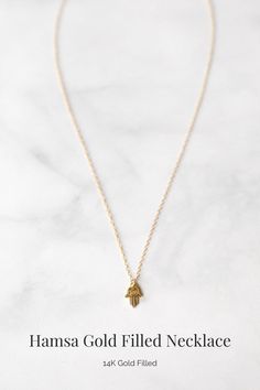 This hasma charm necklace is delicate and minimal, perfect for everyday wear jewelry. This hamsa hand jewelry necklace has a protective vibe and is perfect for your best friend. Dainty 16 Inch Pendant Charm Necklaces, Minimalist 16 Inch Charm Necklace As Gift, Minimalist 16-inch Charm Necklace For Gift, Minimalist 16-inch Charm Necklace As Gift, Hamsa Hand Jewelry, Everyday Wear Jewelry, Tiny Charm, Gold Filled Necklace, Gem Jewelry