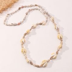 SPECIFICATIONS Fine or Fashion: Fashion Element: Puka Shell Puka Shell Necklace, Puka Shell, Beach Vacations, Memorial Necklace, Sweater Chain, Beach Holiday, Shell Necklaces, Holiday Fashion, Fashion Fashion