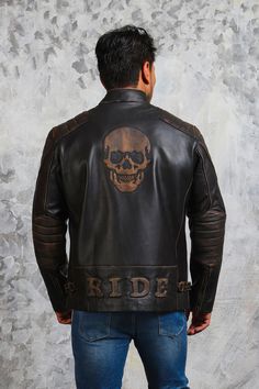 Men's Biker Skull Leather Jacket Rider Skull Embossed Distressed Leather Jacket is manufactured with assurance of a 100% genuine cowhide leather. This skull leather jacket has zipped front closure with padded sleeves and shoulders Outfit Type: Biker Jacket Material:    Outer: Real Leather Type: Cowhide    Inner: Viscose Color: Black Size-Chart Black Biker Outerwear For Halloween, Distressed Moto Leather Jacket For Biker Events, Distressed Leather Biker Jacket For Biker Events, Moto Biker Jacket In Distressed Brown For Biker Events, Gothic Leather Biker Jacket For Biker Events, Biker Style Long Sleeve Leather Jacket For Halloween, Gothic Leather Biker Jacket For Events, Distressed Brown Moto Leather Jacket For Biker Events, Black Leather Jacket For Halloween Biker Events