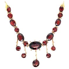 Antique garnet gold necklace Oval- and round-cut garnets of approximately 70-80 carats, 14 karat yellow gold Size: length 15.25 inches Total weight: 42.5 grams Garnet Necklace Gold, Victorian Antiques, Garnet And Gold, Pretty Clothes, Drop Necklace, Queen Anne, Pretty Outfits, Garnet, Gold Necklace