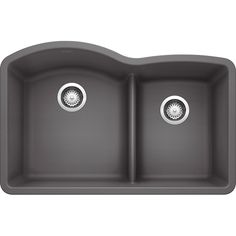 the double bowl kitchen sink has two faucets on one side and an undermounted