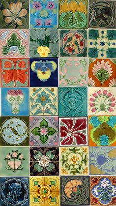 many different colored tiles with flowers and leaves on them