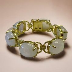 "Lower prices on our main website: https://discomarshmallow.myshopify.com/ Introducing our Sicilian Moonstone Cabochon Bracelet, a blend of history and elegance. The heart of this bracelet holds cabochon moonstones, a classic shape cherished for centuries. These stones have a rich history as they were treasured by ancient civilizations. The gold design is inspired by Sicilian ropes, adding a touch of the island's heritage. What makes this bracelet truly special is its customization. You can choo Luxury Crystal Gemstone Bracelet, Luxury Crystal Bracelet, Elegant Formal Bracelets With Natural Stones, Elegant Moonstone Round Stone Jewelry, Elegant Crystal Bracelet With Natural Stones, Wedding Bracelets With Gemstone Accents, Luxury Oval Bracelets With Natural Stones, Diamond Bracelets With Gemstone Accents, Luxury Wedding Bracelets With Gemstone Accents