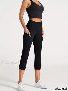 Olivia Mark - Leggings deportivos de tallas grandes para mujer - Leggings capri elásticos de tiro alto con cómodos bolsillos para el móvil Black Sportswear Leggings With Pockets, Black Moisture-wicking Capri Leggings, Black Capri Leggings For Sports, Yoga Capri Leggings With Pockets, Workout Capri Leggings With Pockets, Sports Solid Capri Length Bottoms, Capri-length Leggings With Pockets For Workout, High Stretch Solid Color Capris For Sports, High Stretch Solid Color Sports Capris