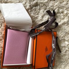 New Hermes Calvi Special Order Card Wallet. This Special Order Is In Beautiful Mauve Sylvestre And Craie Epsom Leather. Width: 2.8 In Height:4.1 In This Hermes Calvi Special Order Will Include The Wallet, Box, And Ribbon. This Would Make A Beautiful Gift For Any Occasion. *Please Note Photos Form Part Of Description. Color May Vary Depending On Phone, Screen Or Lighting. Comes From Smoke Free And Pet Friendly Home. Let Me Know If You Have Any Questions. Sorry No Returns, Cancellations, Or Refund Pink Rectangular Wallet With Original Box, Elegant Pink Card Holder For Travel, Formal Pink Wallets With Interior Card Slots, Luxury Pink Bifold Wallet, Pink Rectangular Card Holder For Formal Use, Card Holder With Original Box As Gift, Formal Pink Bifold Wallet, Designer Pink Wallets For Formal Occasions, Hermes Calvi