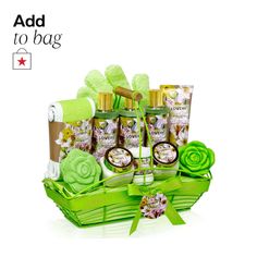 a green basket filled with lots of different types of soaps and lotion bottles