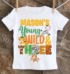 An adorable zoo animals Young Wild and Three themed birthday shirt personalized with your child's name. All shirts are 100% cotton.  I use a professional heat press to transfer the image, NOT a home iron. I will personalize it with your child's name and age for no additional cost. I use high quality shirts from ARB Blanks.  These are very soft shirts, not thin undershirts. Please see the size chart below for the t-shirts and choose your options in the drop down menus. I also carry Carter's brand Safari Birthday Shirt, Young Wild And Three Birthday, Third Birthday Shirt, Young Wild And Three, Heat Press Shirts, Animals Birthday, Safari Birthday, Third Birthday, Adulting Shirts