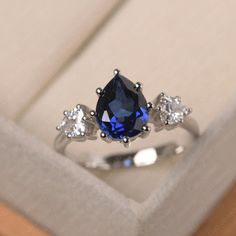 Custom Sapphire Engagement Ring Vintage Three Stone Ring | Etsy Pear-shaped Sapphire Ring, Fine Jewelry Three Stone Teardrop, Pear-shaped Three Stone Jewelry For Anniversary, Teardrop Three Stone Jewelry Gift, Teardrop Three Stone Jewelry For Gifts, Elegant Teardrop Three-stone Jewelry, Elegant Teardrop Three Stone Jewelry, Pear-shaped Three Stone Jewelry Gift, Elegant Three Stone Teardrop Jewelry