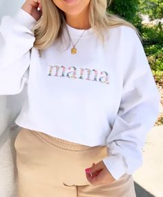 This dainty and pretty floral embroidered crewneck will be moms new favorite! *Floral design is around 8 inches on shirt. Custom Embroidered White Tops For Mother's Day, White Tops With Embroidered Graphics For Mother's Day, White Embroidered Tops For Mother's Day, Embroidered White Tops For Mother's Day, Trendy Sweatshirt With Letter Embroidery For Spring, White Tops With Letter Embroidery For Mother's Day, Embroidered Tops For Everyday Spring Wear, Spring Embroidered Top For Everyday Wear, Everyday White Tops With Letter Embroidery