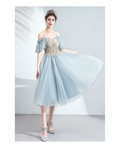 Buy Dusty Green Blue Tea Length Party Dress With Straps at wholesale price online. Free shipping and pro custom service since 2009. Light Blue Knee-length Dress For Banquet, Blue A-line Evening Dress For Spring, Light Blue Evening Dress For Summer Banquet, Summer Banquet Evening Dress, Midi Length, Summer Banquet Midi Length Evening Dress, Summer Banquet Midi Evening Dress, Blue Spring Banquet Dress, Spring Prom Dresses With Stretch, Spring Stretch Prom Dresses