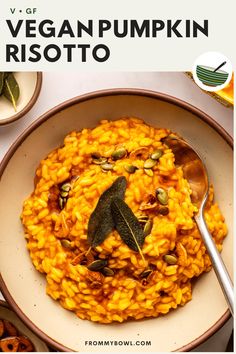 a bowl filled with pumpkin risotto on top of a table