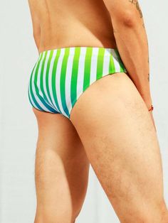 Add a timeless classic to your swimwear collection with our Striped Print Swim Brief. Perfectly capturing the essence of nautical style, this swim brief features a crisp and stylish striped print. The clean lines and contrasting colors create a visually appealing look that is both sophisticated and versatile. Features: Pattern Type: Striped Type: Briefs Fabric: High Stretch Material: Fabric Care Instructions: Machine wash, do not dry clean. Size Chart ( Inches ): Size US Length Waist Size S 36 1 Striped Swim Trunks For Beachwear, Striped Swim Trunks For Swimming, Striped Swim Trunks For Swimming Beachwear, Striped Beachwear For Sunbathing, Striped Stretch Swimwear For Sunbathing, Striped Summer Bottoms For Sunbathing, White Swimwear With Contrast Stripes For Swimming, Striped Stretch Swimwear For Swimming, Striped Beachwear For Pool