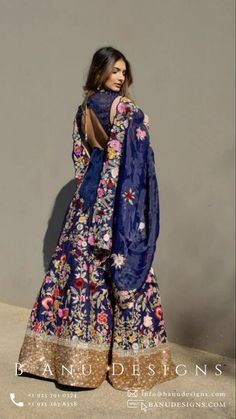 Paint your life with this multicolor embroidered this stunning navy blue lengha that is bound to make you stand out! Blue Bohemian Sharara For Reception, Bohemian Blue Set With Floral Embroidery, Bohemian Blue Sets With Floral Embroidery, Blue Sharara With Floral Embroidery In Traditional Drape, Designer Blue Sharara With Floral Embroidery, Blue Bohemian Choli For Designer Wear, Anarkali Choli With Floral Embroidery, Bohemian Anarkali Set With Floral Embroidery For Navratri, Anarkali Choli With Floral Embroidery For Diwali