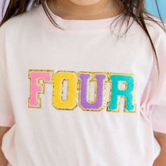 The Fourth Birthday Patch Short Sleeve T-Shirt is a fun and festive t-shirt for celebrating their Fourth Birthday! Features: Shirt Color: Ballet Pink Patch Color: Multicolor chenille with gold glitter outline Material: 100% Cotton Features: Tagless inside neck label for an itch-free wear Fit: Toddler Unisex; True to Size Care: Machine washable, wash inside out, lay flat to dry, wash with like colors Each t-shirt is hand pressed with love in our hometown warehouse. Pink Patch, Fourth Birthday, Manhattan Toy, Ballet Pink, Neck Label, Easter Outfit, Outerwear Outfit, Patch Kids, Custom Tees